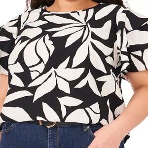 Vince Camuto Black and White blouse with ruffled sleeves